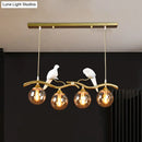 GobekUsa Postmodern Iron Pendant Light with 4-Lights, Black/Gold Finish, Amber Ball Glass Shade, Bird Deco - Sprig Island
