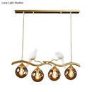 GobekUsa Postmodern Iron Pendant Light with 4-Lights, Black/Gold Finish, Amber Ball Glass Shade, Bird Deco - Sprig Island