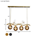 GobekUsa Postmodern Iron Pendant Light with 4-Lights, Black/Gold Finish, Amber Ball Glass Shade, Bird Deco - Sprig Island
