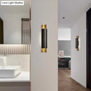 GobekUsa LED Wall Mount Sconce - Pipe Shaped Postmodern Metal Bedside Lighting in Black and Gold