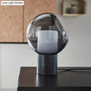 GobekUsa Black LED Table Lamp with Marble Base and Smoked Globe Glass Shade - Postmodern Nightstand Light