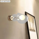 GobekUsa Postmodern Brass Wall Sconce Light with Clear/Amber Glass Shade