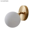 GobekUsa Rotatable Glass Wall Sconce - Small and Stylish Postmodern Brass Light