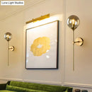 GobekUsa Postmodern Brass Pencil Arm Wall Lamp Sconce with Ball Glass Shade