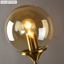 GobekUsa Postmodern Brass Pencil Arm Wall Lamp Sconce with Ball Glass Shade