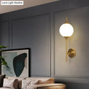 GobekUsa Postmodern Brass Wall Sconce: White Glass Geometric Wall Lighting for Living Room
