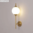 GobekUsa Postmodern Brass Wall Sconce: White Glass Geometric Wall Lighting for Living Room