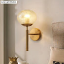 GobekUsa Postmodern Brass Sconce Bedside Wall Light with Textured Glass Shade - 1-Bulb Ball Shaped Lamp