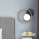 GobekUsa Postmodern Gold and Black Ring Wall Mounted Sconce Lamp - 1-Light Metallic Fixture