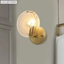 GobekUsa Gold Metal Wall Sconce with Clear Glass Shade - Postmodern 1-Light Fixture