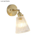GobekUsa Postmodern Gold Wall Light with Clear Ribbed Glass - Conical Design, Rotating Feature, 1 Light Kit