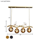 GobekUsa Postmodern Iron Pendant Light with 4-Lights, Black/Gold Finish, Amber Ball Glass Shade, Bird Deco - Sprig Island