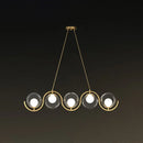 GobekUsa Postmodern Island Light Fixture: Wavy Metallic Hanging Lamp with Glass Shade