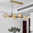 GobekUsa Postmodern Island Lighting: Amber Ball Pendant Lamp with Adjustable Cord - 8 Lights Glass