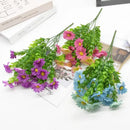 Purple and yellow daisy bouquet green plant synthetic flowers living room by Decorbites