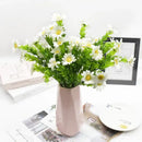 Purple and yellow daisy bouquet green plant synthetic flowers living room by Decorbites