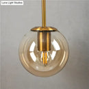 Retro modern glass smoked globe wall lamps for bedroom lighting by Decorbites