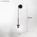 Retro modern glass smoked globe wall lamps for bedroom lighting by Decorbites