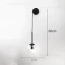 Retro modern glass smoked globe wall lamps for bedroom lighting by Decorbites