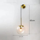Retro modern glass smoked globe wall lamps for bedroom lighting by Decorbites