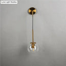 Retro modern glass smoked globe wall lamps for bedroom lighting by Decorbites