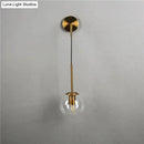 Retro modern glass smoked globe wall lamps for bedroom lighting by Decorbites