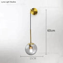 Retro modern glass smoked globe wall lamps for bedroom lighting by Decorbites
