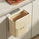 Ribbed cream and gray kitchen cabinet hanging trash by Decorbites