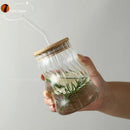 Ribbed glass cup with bamboo lid and straw kitchen tumbler by Decorbites