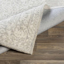 Roessleville Cream Wool Area Rug