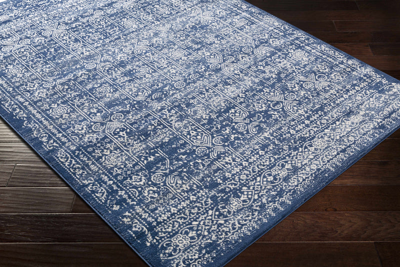 Michie Dark Blue Area Rug - Clearance