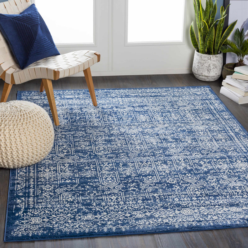 Michie Dark Blue Area Rug - Clearance