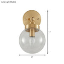 GobekUsa Rotatable Bedroom Wall Lamp in Brass with Clear Glass and Modernist Ball Design