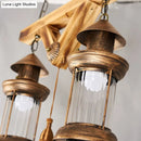 GobekUsa Bronze Coastal Glass Lantern Pendant Light - 4-Light Island Fixture