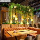 GobekUsa Rustic Wooden Linear Suspension Lamp: Green Island Light Fixture with Decorative Vines and Rose Accents