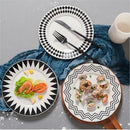 Scandinavian black & white geometric ceramic dessert plates dining room by Decorbites