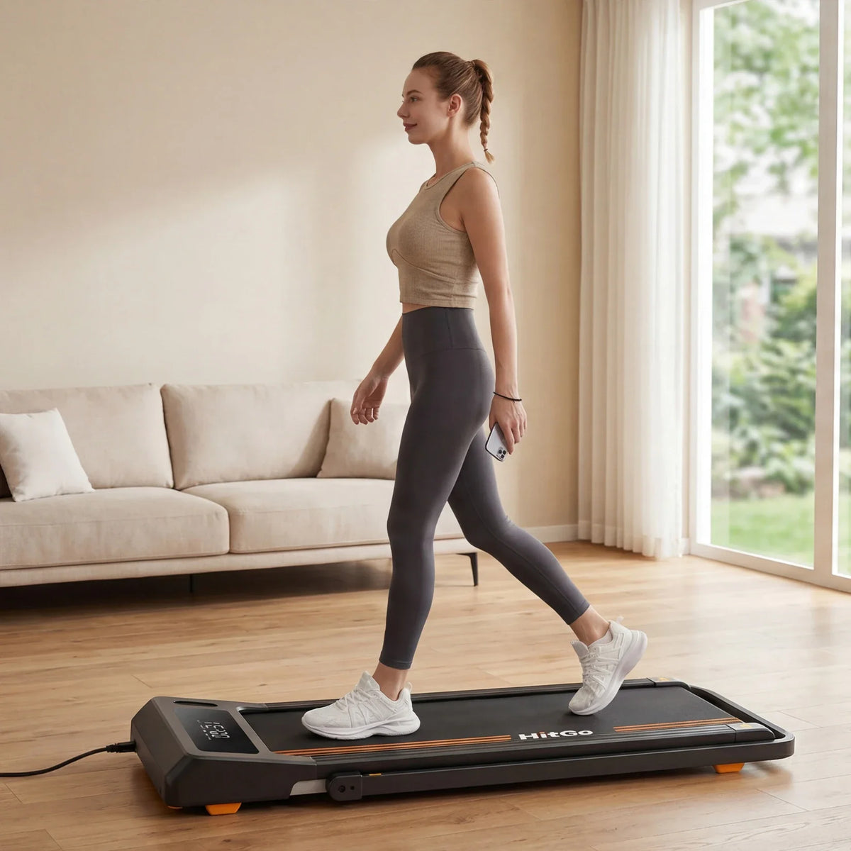 H1 2 in 1 Under-desk treadmill, installed in a room