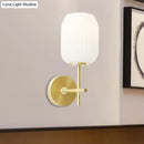 GobekUsa Simple Gold Bedside Wall Sconce with Lantern Cream Glass Shade - 1 Light Fixture