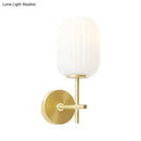 GobekUsa Simple Gold Bedside Wall Sconce with Lantern Cream Glass Shade - 1 Light Fixture