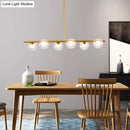 GobekUsa Sleek 6-Light Modern Island Pendant: Transparent Glass Ceiling Light for Dining Table