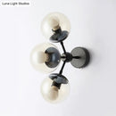 GobekUsa Sleek Black Glass Wall Mounted Vanity Light with 3 Spherical Bulbs - Modern Bathroom Lighting