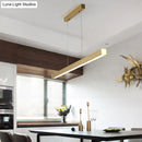 GobekUsa Sleek Brass Island Lamp: Simplicity Pole-Shaped LED Suspension Lighting for Acrylic Dining Rooms