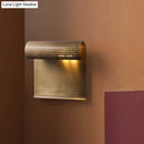GobekUsa Sleek Brass Wall Sconce: Scrolled Design, Wall Mounted, 1-Bulb, Ideal for Bedroom Lighting
