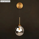 GobekUsa Sleek Silver Glass Ball Wall Hanging Lamp with Brass Mount - Perfect Bedroom Lighting Solution