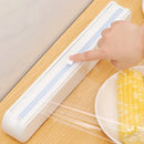 Sleek white cling film dispenser cutter – kitchen food wrap box by Decorbites