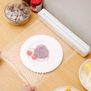 Sleek white cling film dispenser cutter – kitchen food wrap box by Decorbites