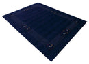 Hand Loomed Blue Wool Area Rug - Red and White Border Patterns by The Rug Decor