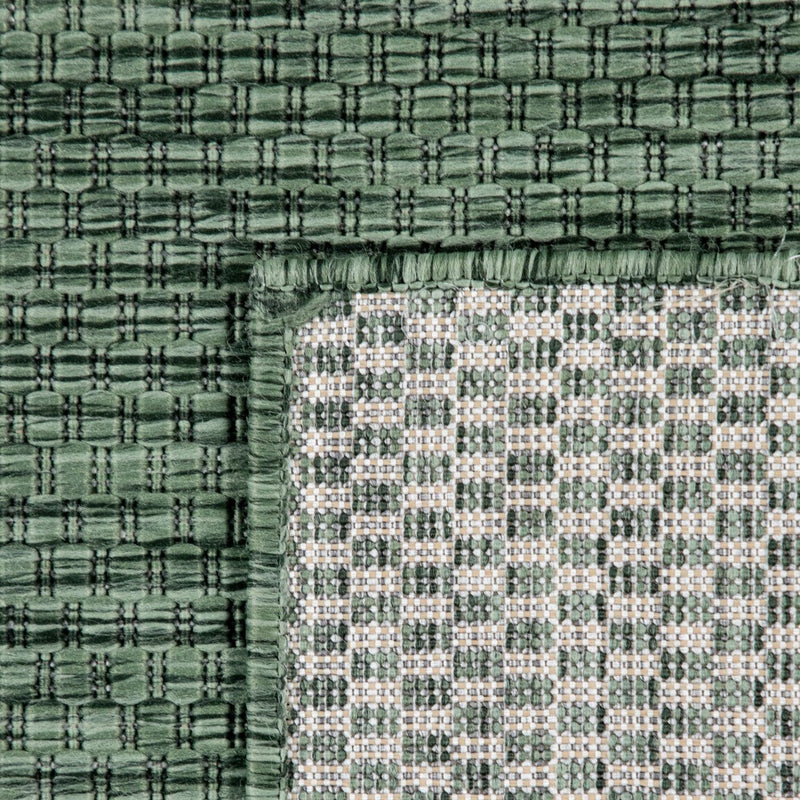 Solid Outdoor Rug for Patio or Balcony weatherproof in Mottled Dark Green
