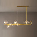 GobekUsa Stylish Brass Finish Postmodern Suspension Lamp with Glass Shade - Creative Island Light featuring Ball and Lotus Leaf Design