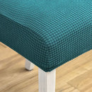 Teal blue quilted chair cover stretch elastic dining room protector by Decorbites